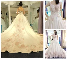 Guangzhou Gloria Feeling Wedding Dress Co Ltd 2016 New Elegant Flower Dress Embroidery Lace Sleeveless Low Back Long Tail Real Picture Latest Bridal