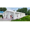 Large white camping tents with Windows are suitable for weddings