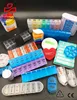 2020 Athmedic food grade Custom Logo medicine tablet drug color Pill Reminders Pop-up weekly pill organizer with 4 boxes a day
