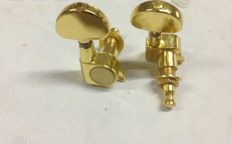 golden guitar turning pegs.png
