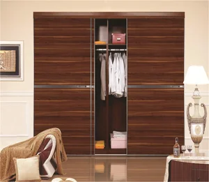 Wooden Almirah Designs In Bedroom Wall With Red Brown Color