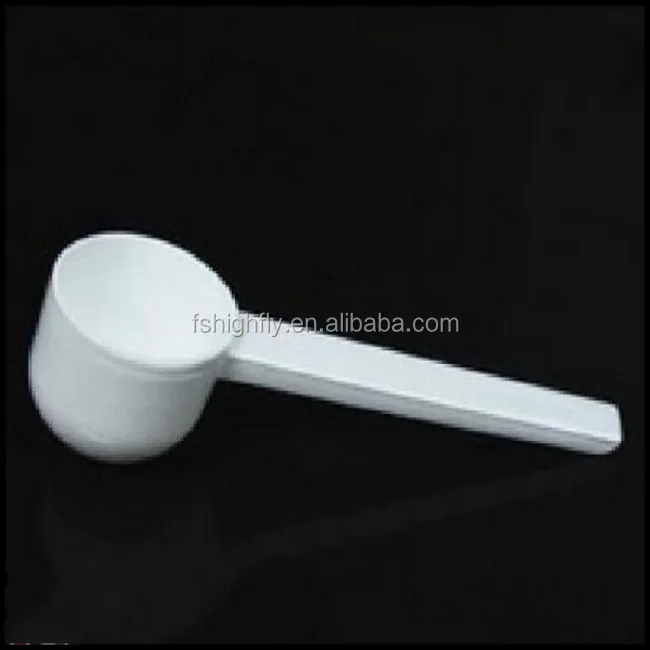 white plastic measuring spoon scoop 5g