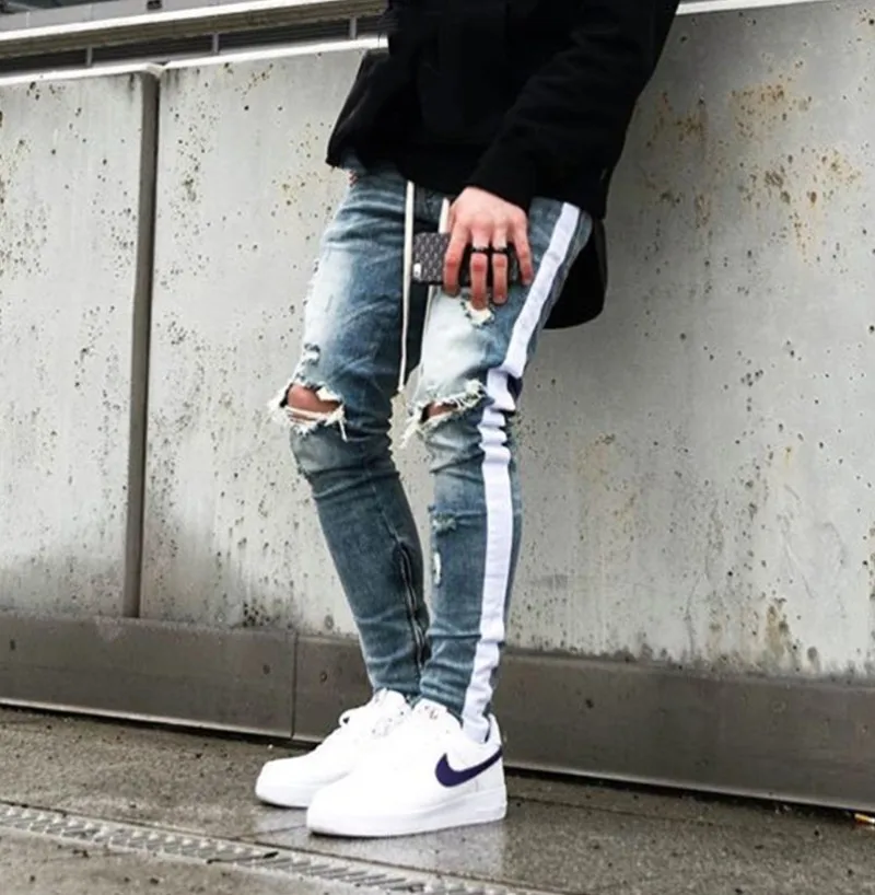 ripped jeans with side stripe