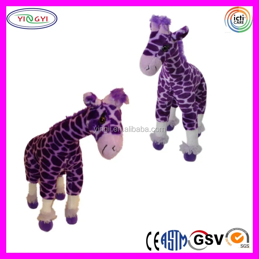 purple stuffed animal giraffe