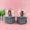 Left to right snowflake crystal ball music box couple sky city romantic gift music box