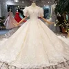LSS201 Ostrich feather wedding dress 11.11 off the shoulder short sleeve ball gown hot selling lace wedding gown actual images