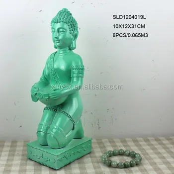 large plastic buddha statue