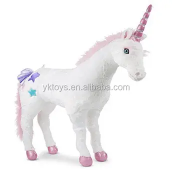 huge pink unicorn stuffed animal