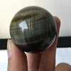 ball wholesale natural rock rainbow obsidian crystal balls for sale obsidian cat eye sphere for home decoration