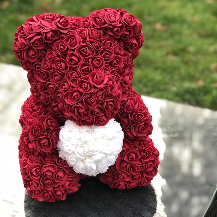 red flower teddy bear