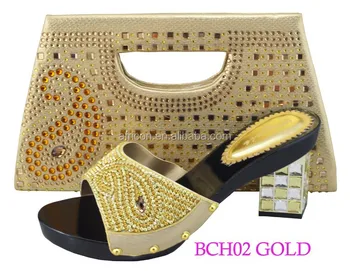 gold shoes with matching bag