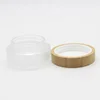 /product-detail/cosmetic-5ml-15ml-30ml-50ml-100ml-clear-frosted-glass-jar-with-bamboo-lid-for-face-hand-cream-62062193463.html