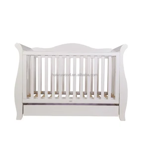 white cot bed with drawer and mattress