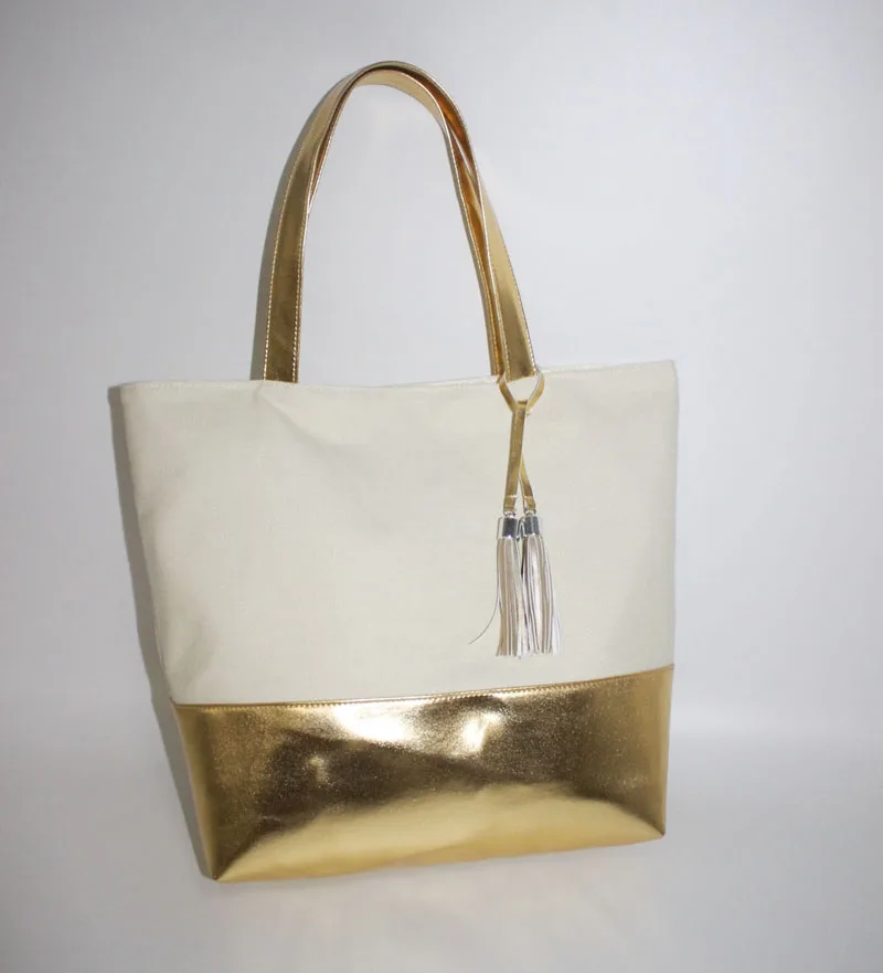white and gold beach bag