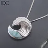 Sterling Silver Natural Larimar And Pave CZ Wave Necklace Pendant