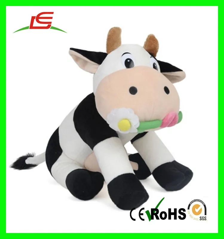 black and white stuffed cow