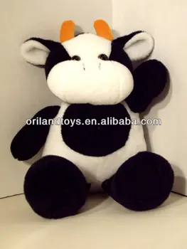 black and white stuffed cow