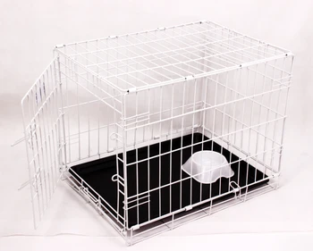 white dog cage