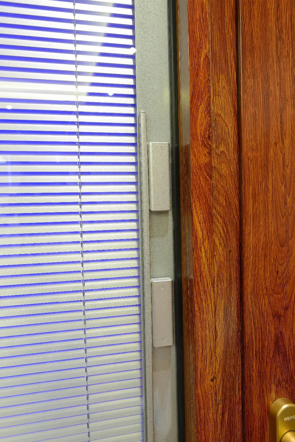 What are some brands that offer high-quality indoor wood shutters?