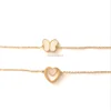 Stainless steel double heart conch chain bracelet