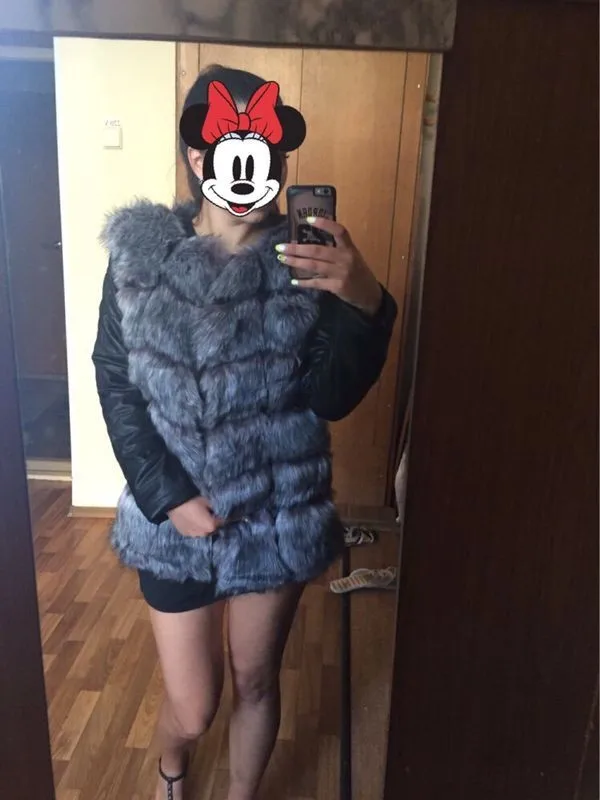 Fashionable winter coat women's thick artificial fox fur coat and PU sleeve women's fake leather jacket