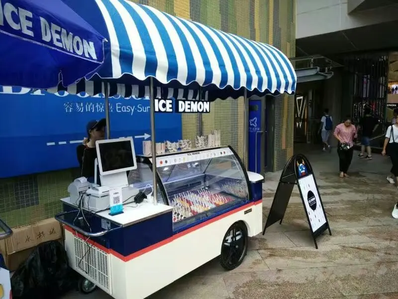 self checkout set and ice cream cart