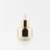 Luxury essential oil unique serum 20ml 30 ml 40ml 50ml clear glass bottle with dropper with golden shoulder