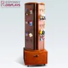 Hot sale customized rotating floor shelves wood spinner display with drawer