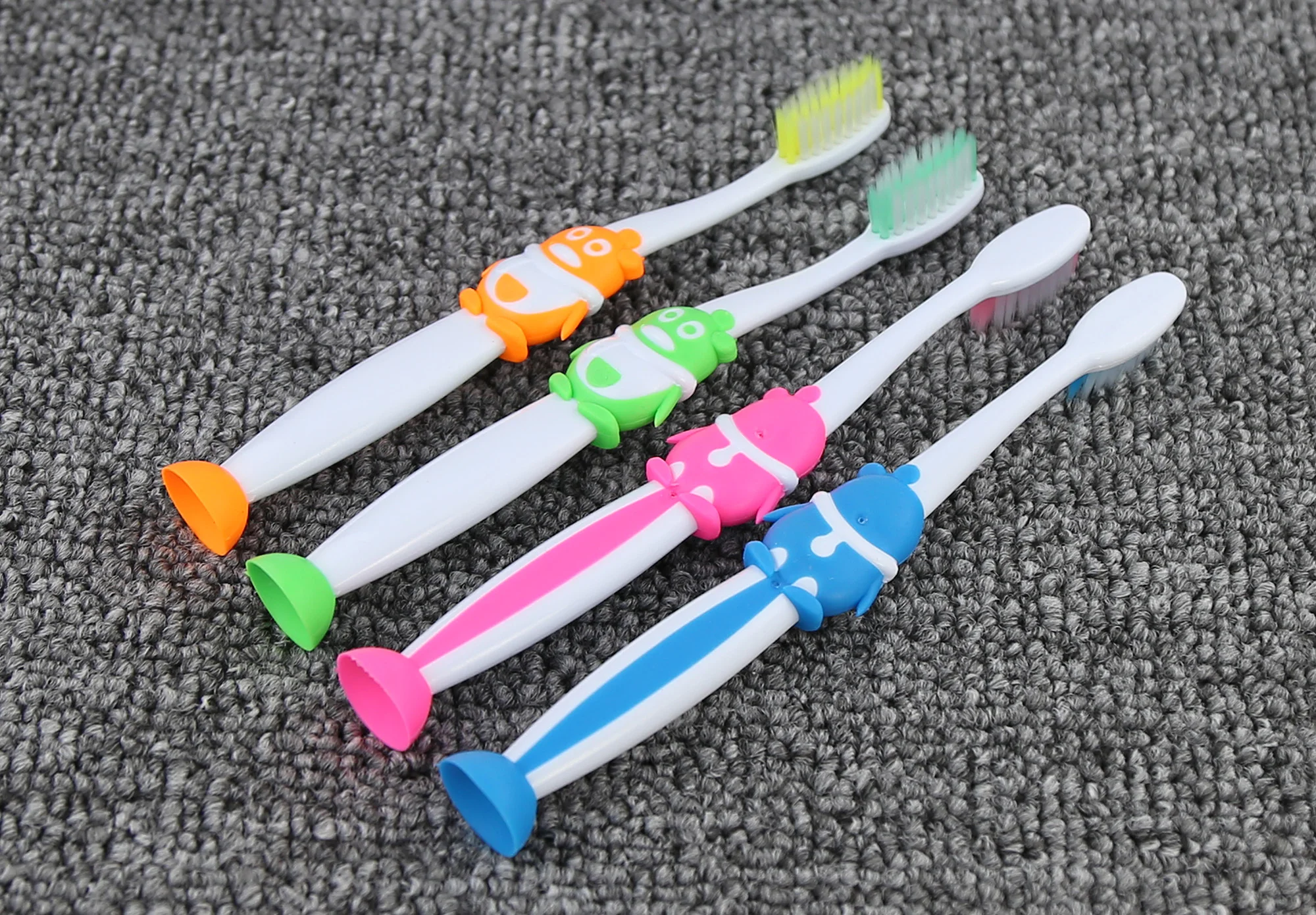 Soft Tapered Bristles Kids Toothbrush With Suction Penguin Shape Handle