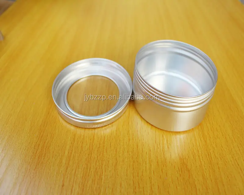 small tins with clear lids