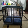 Large black iron dog cage inside dog kennel