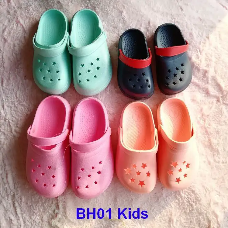 
stock lot shoes children clogs kids hole garden shoes 