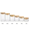 Wholesales 50ml 80ml 100ml 120ml 150ml empty mini high quality clear glass spice storage jar with bamboo cork lid