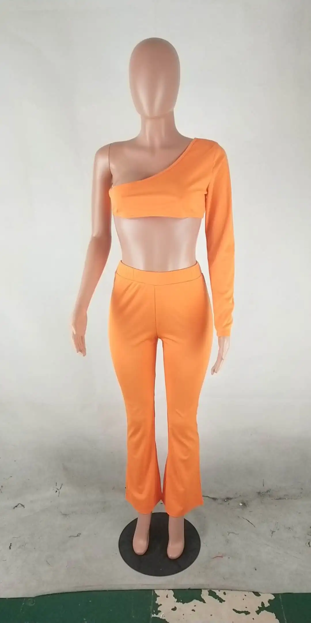 Sexy orange solid one shoulder crop top and wide leg pants asymmetry sleeves women two piece set