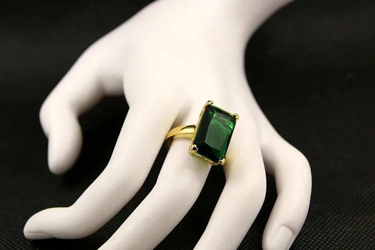 green stone gold ring design for female