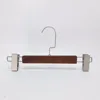 DL High quality inventory lotos wooden hanger is sold at a low price with brown color on wholesale
