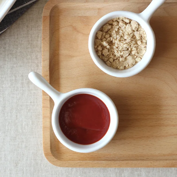 Hot selling restaurant serving japanese round ceramic soy sauce dish with handle  .png