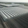 South Korean model multi span film greenhouse double frame warm greenhouse in Uzbekistan