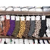Low MOQ happy style wholesale leopard jacquard custom man sock