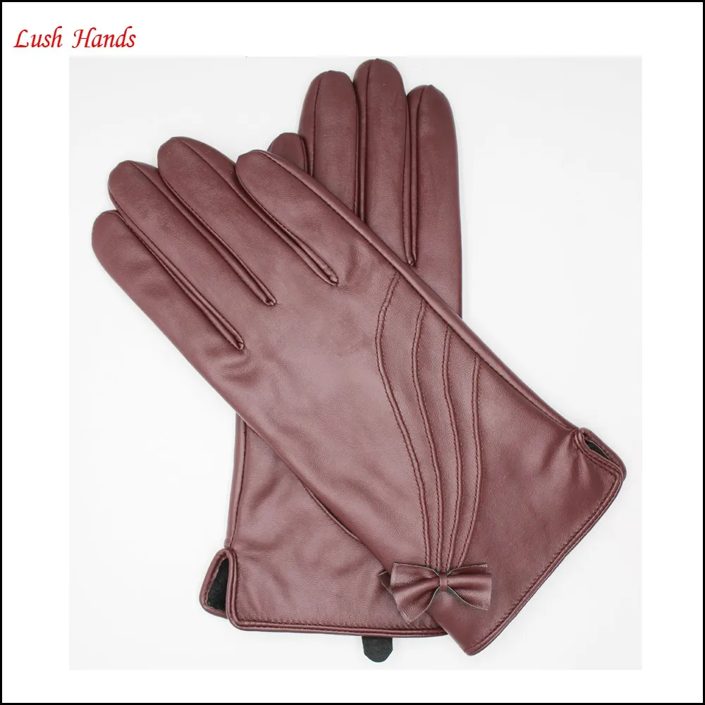 ladies and women's wine red leather gloves with Quilting and bow back