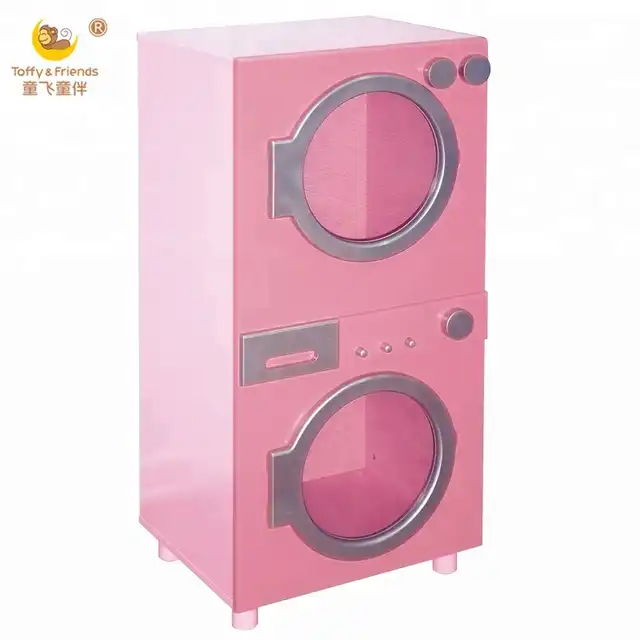 pink wooden kitchen with washing machine