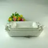 Cheap wholesale embossed round oval rectangle ceramic baking set with handle
