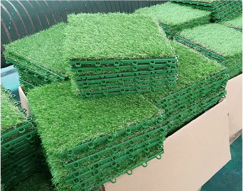 interlocking outdoor tiles over grass