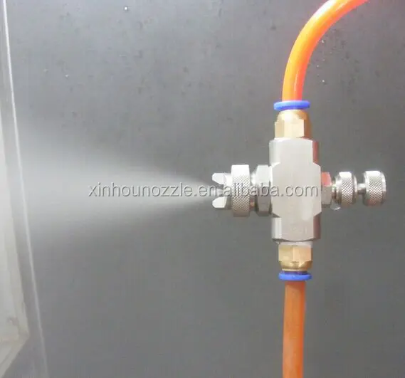 Air atomizing nozzle