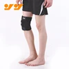 Compression neoprene knee support with adjustable spring support and compression silicon pad