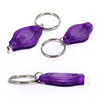muestra gratis de productos Cheap Bulk Gifts Give Aways Led Lantern Keychain Keyring Promotional Plastic Key Ring