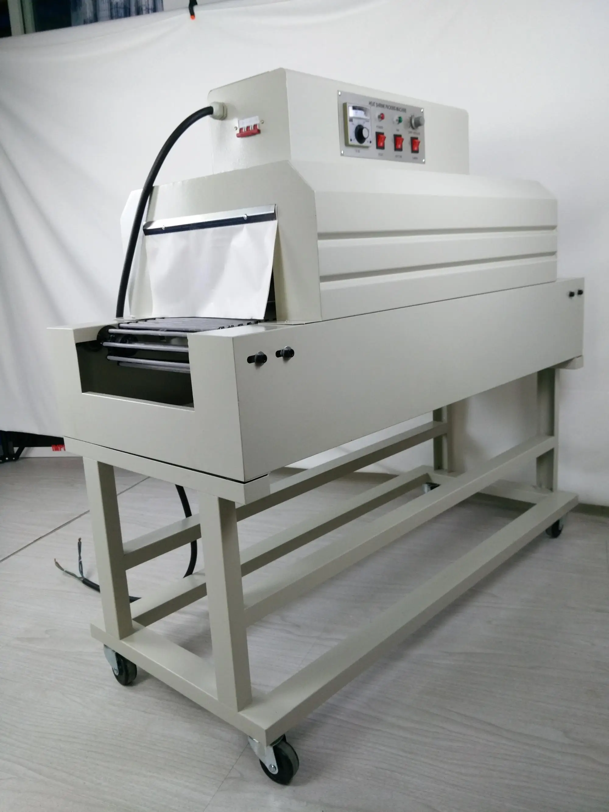 Automatic Pe Film Heat Shrink Packaging Machine - Buy Shrink Wrapping ...