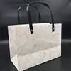 Cheap garment gift carry customised logo printing white paper marbling shopping bag with rivet