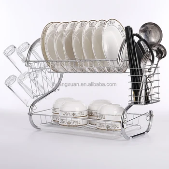 Open Kitchen Cabinet With Two Layers Of Stainless Dish Rack Stock
