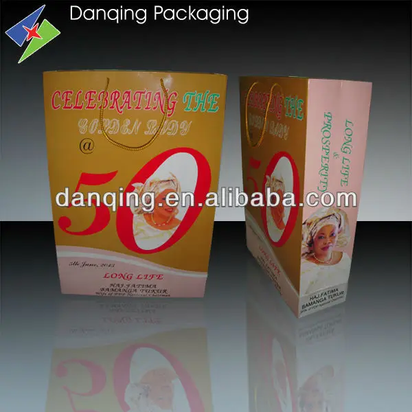 China DQ PACK high quality plastic paper bag with handle for gift packaging
